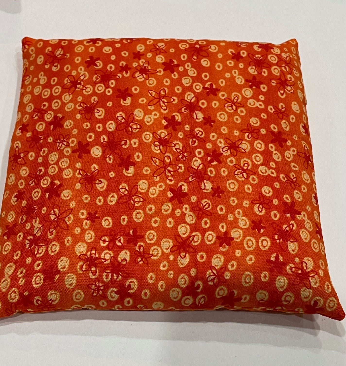 Orange with Light Orange Circles and Dark Orange Flowers Pattern Medium Square 7 x 7 Heating Pad