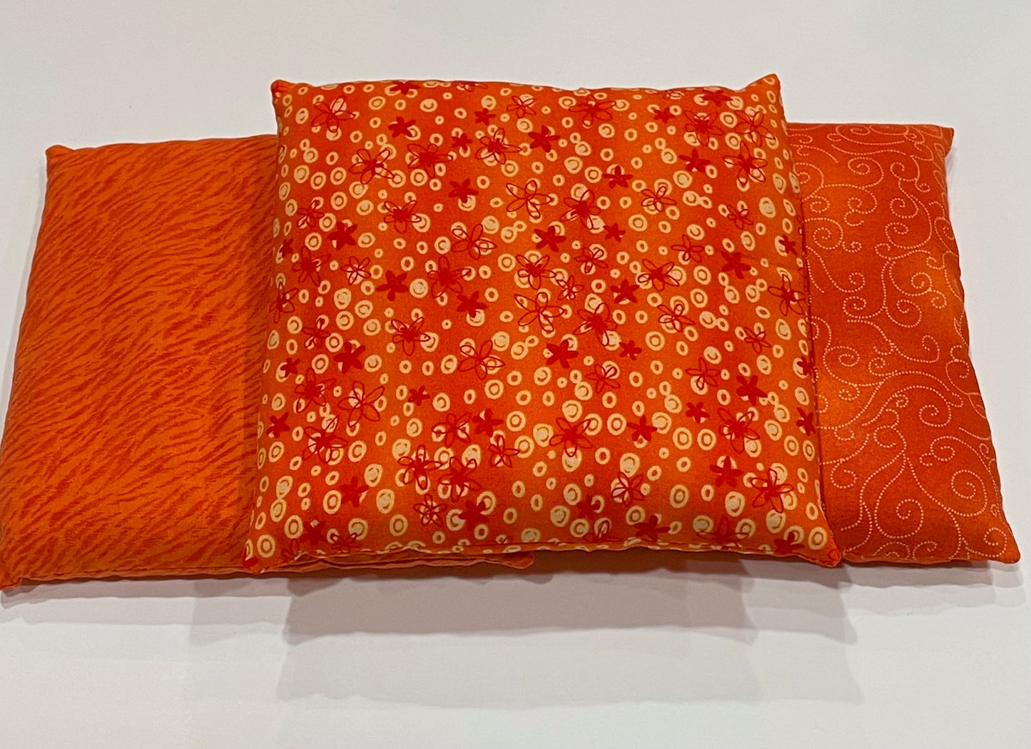 Orange with Light Orange Circles and Dark Orange Flowers Pattern Medium Square 7 x 7 Heating Pad